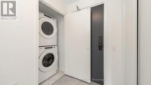 313 - 395 Dundas Street W, Oakville, ON - Indoor Photo Showing Laundry Room