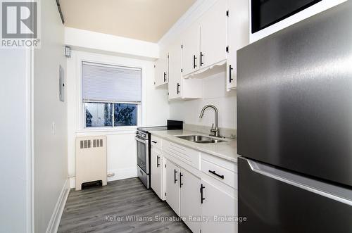 2 - 145 Victoria Avenue S, Hamilton (Stinson), ON - Indoor Photo Showing Kitchen With Double Sink