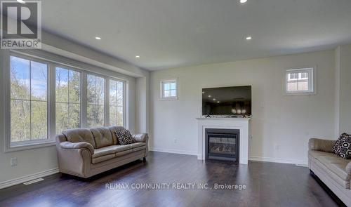 43 Olerud Drive, Whitby, ON - Indoor Photo Showing Living Room With Fireplace