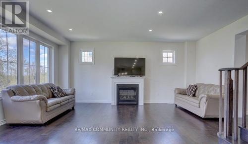 43 Olerud Drive, Whitby, ON - Indoor Photo Showing Living Room With Fireplace