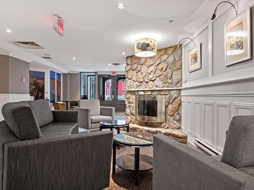 Reception area - 208-3035 Ch. De La Chapelle, Mont-Tremblant, QC - Indoor Photo Showing Living Room With Fireplace