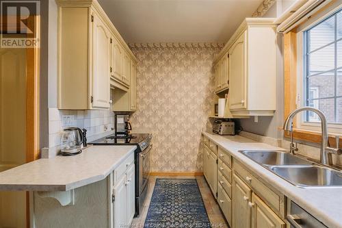 2155 Pelissier, Windsor, ON - Indoor Photo Showing Kitchen With Double Sink