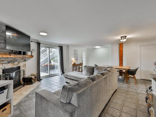 Autre - 1200 Av. Du Parc, Saint-Jérôme, QC - Indoor Photo Showing Living Room With Fireplace