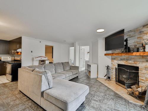 Salon - 1200 Av. Du Parc, Saint-Jérôme, QC - Indoor Photo Showing Living Room With Fireplace