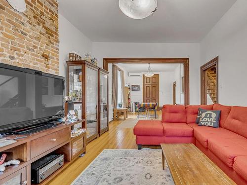 Salon - 399 Rue St-Jean, Québec (La Cité-Limoilou), QC - Indoor Photo Showing Living Room With Fireplace