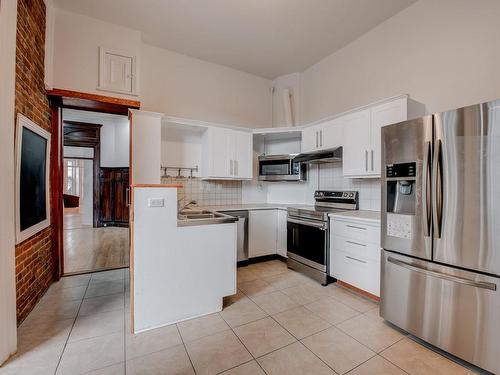 Cuisine - 100-1572 Av. Summerhill, Montréal (Ville-Marie), QC - Indoor Photo Showing Kitchen With Double Sink