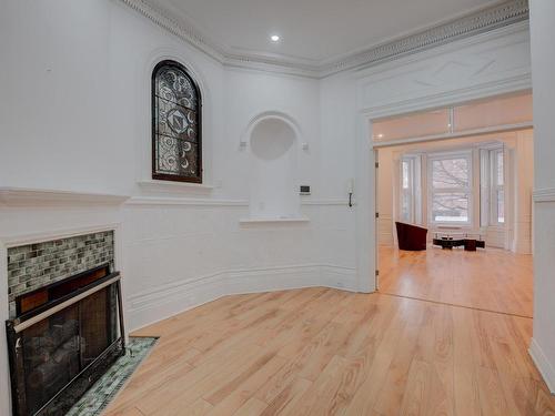 Bureau - 100-1572 Av. Summerhill, Montréal (Ville-Marie), QC - Indoor Photo Showing Other Room With Fireplace