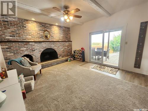 206 Heather Avenue, Ogema, SK - Indoor Photo Showing Living Room With Fireplace