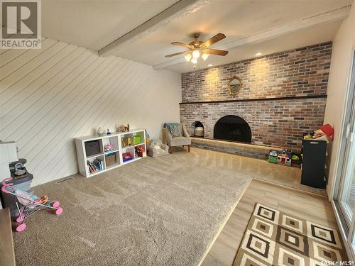 206 Heather Avenue, Ogema, SK - Indoor Photo Showing Other Room With Fireplace