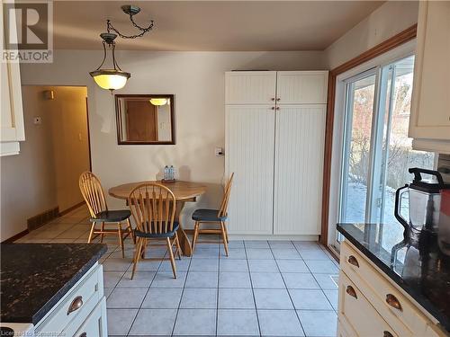 Dining area featuring light tile patterned floors - 140 Alvin Street, Waterloo, ON - Indoor Photo Showing Other Room