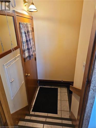 Entryway featuring light tile patterned floors - 140 Alvin Street, Waterloo, ON - Indoor Photo Showing Other Room