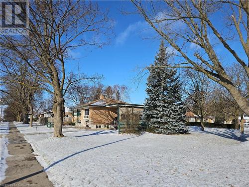 View of yard covered in snow - 140 Alvin Street, Waterloo, ON - Outdoor