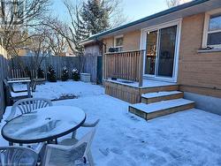 View of yard covered in snow - 