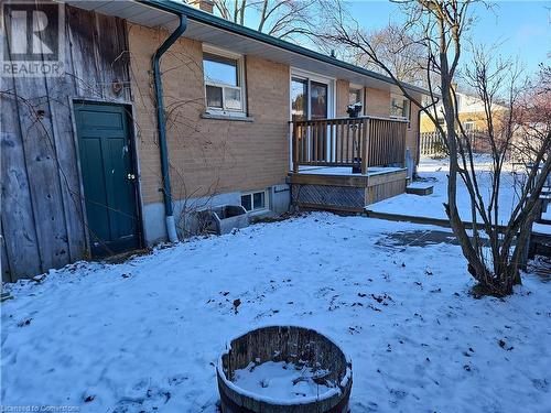 View of snow covered exterior - 140 Alvin Street, Waterloo, ON - Outdoor With Deck Patio Veranda