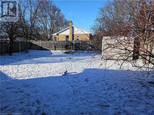 View of yard covered in snow - 140 Alvin Street, Waterloo, ON - Outdoor