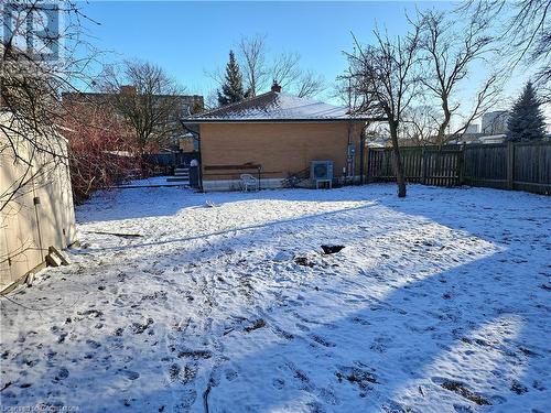 View of snowy yard - 140 Alvin Street, Waterloo, ON - Outdoor