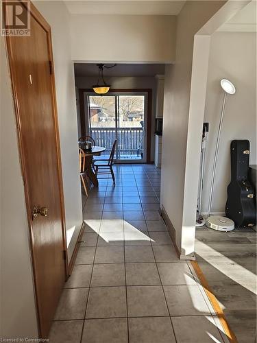 Hallway with tile patterned floors - 140 Alvin Street, Waterloo, ON - Indoor Photo Showing Other Room