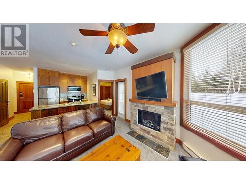 4559 Timberline Crescent Unit# 618 C, Fernie, BC - Indoor Photo Showing Living Room With Fireplace