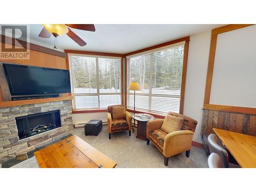 4559 Timberline Crescent Unit# 618 C, Fernie, BC - Indoor Photo Showing Living Room With Fireplace