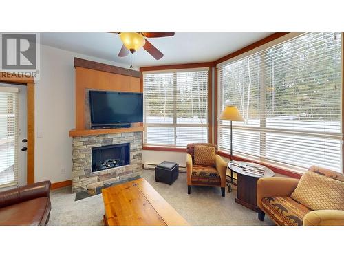 4559 Timberline Crescent Unit# 618 C, Fernie, BC - Indoor Photo Showing Living Room With Fireplace