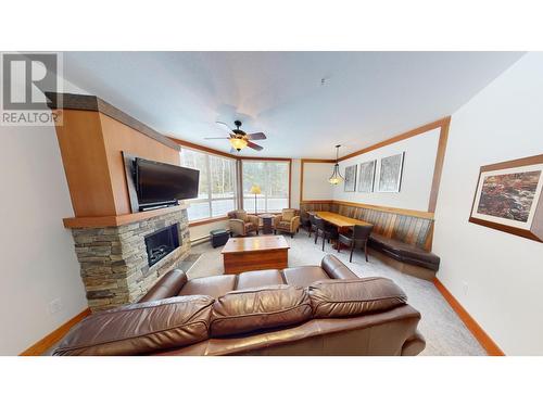 4559 Timberline Crescent Unit# 618 C, Fernie, BC - Indoor Photo Showing Living Room With Fireplace