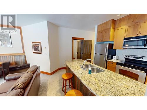 4559 Timberline Crescent Unit# 618 C, Fernie, BC - Indoor Photo Showing Kitchen With Double Sink