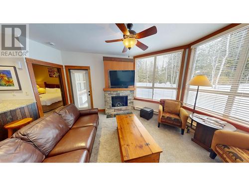 4559 Timberline Crescent Unit# 618 C, Fernie, BC - Indoor Photo Showing Living Room With Fireplace