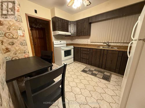 128 Chisholm Avenue, Toronto, ON - Indoor Photo Showing Kitchen With Double Sink