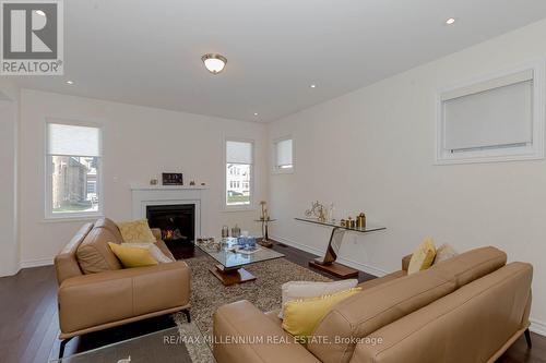 639 Bearberry Place, Milton, ON - Indoor Photo Showing Living Room With Fireplace