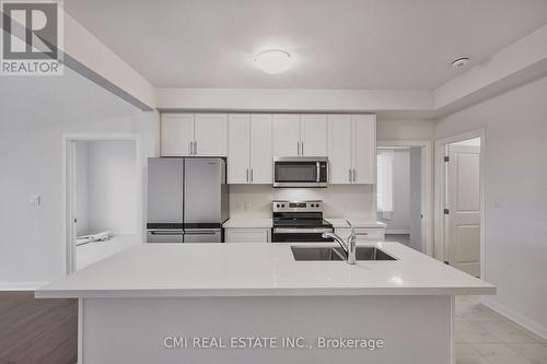 12 Oakmont Drive, Loyalist, ON - Indoor Photo Showing Kitchen With Double Sink