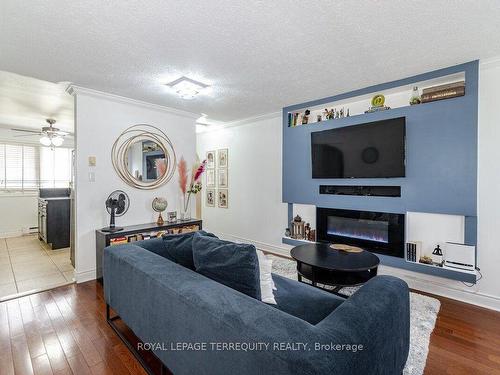 2-55 Blandford St, Woodstock, ON - Indoor Photo Showing Living Room With Fireplace