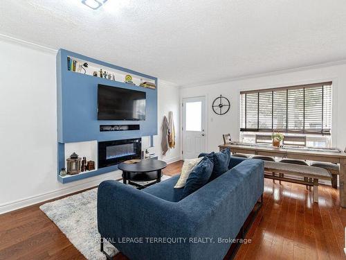 2-55 Blandford St, Woodstock, ON - Indoor Photo Showing Living Room With Fireplace