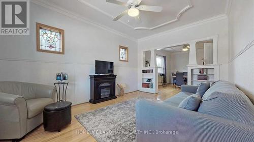 521 Sammon Avenue, Toronto, ON - Indoor Photo Showing Living Room With Fireplace