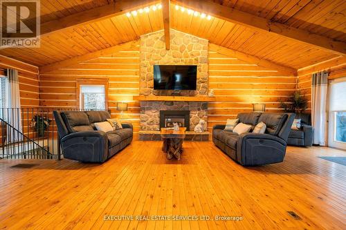 795744 Grey Road 19, Blue Mountains, ON - Indoor Photo Showing Living Room With Fireplace