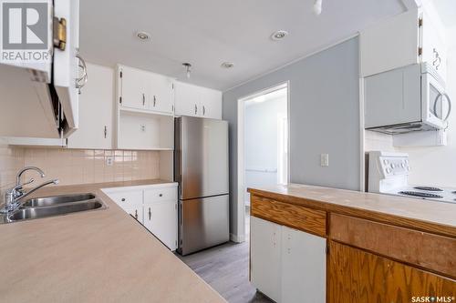 1525 Regent Street, Regina, SK - Indoor Photo Showing Kitchen With Double Sink