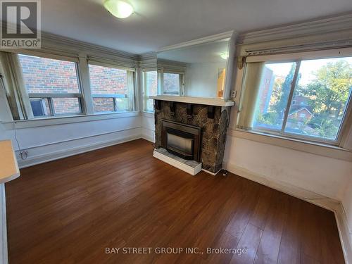 2Nd Flr - 218 Heath Street W, Toronto, ON - Indoor Photo Showing Living Room With Fireplace