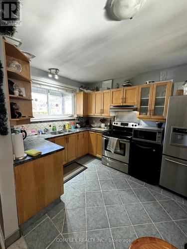 309 Rossland Road W, Whitby, ON - Indoor Photo Showing Kitchen With Double Sink