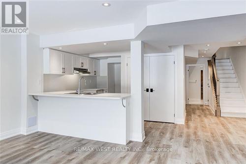 22 - 113 Hartley Avenue, Brant, ON - Indoor Photo Showing Kitchen With Double Sink