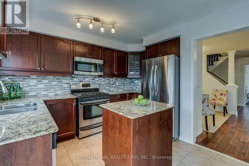 4881 Capri Crescent, Burlington, ON - Indoor Photo Showing Kitchen With Double Sink