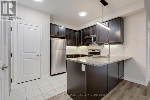 202 - 2333 Sawgrass Drive, Oakville, ON - Indoor Photo Showing Kitchen With Upgraded Kitchen