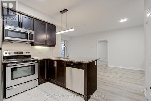 202 - 2333 Sawgrass Drive, Oakville, ON - Indoor Photo Showing Kitchen