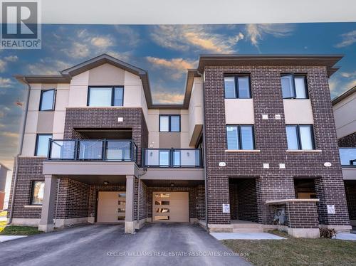 540 Bellflower Court, Milton, ON - Outdoor With Balcony With Facade