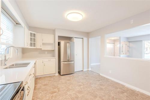 38 Ashworth Street, Winnipeg, MB - Indoor Photo Showing Kitchen With Double Sink