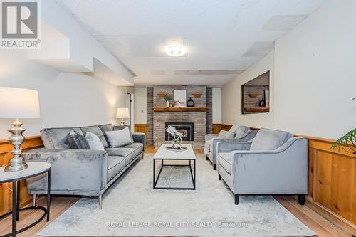 517 Kortright Road W, Guelph (Hanlon Creek), ON - Indoor Photo Showing Living Room With Fireplace