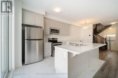 471 Gordon Krantz Avenue, Milton, ON - Indoor Photo Showing Kitchen With Stainless Steel Kitchen With Double Sink With Upgraded Kitchen