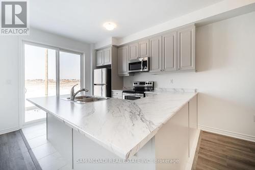 471 Gordon Krantz Avenue, Milton, ON - Indoor Photo Showing Kitchen With Double Sink