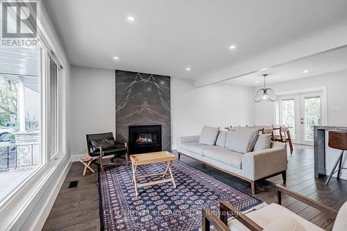 22 Shortland Crescent, Toronto, ON - Indoor Photo Showing Living Room With Fireplace