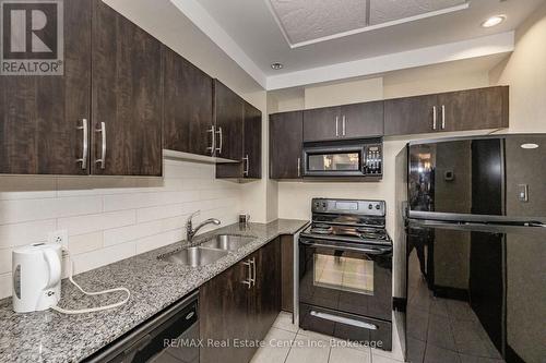 1510 - 3504 Hurontario Street, Mississauga (Hurontario), ON - Indoor Photo Showing Kitchen With Double Sink With Upgraded Kitchen