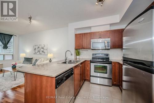 1510 - 3504 Hurontario Street, Mississauga (Hurontario), ON - Indoor Photo Showing Kitchen With Stainless Steel Kitchen With Double Sink