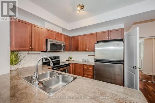 1510 - 3504 Hurontario Street, Mississauga (Hurontario), ON - Indoor Photo Showing Kitchen With Stainless Steel Kitchen With Double Sink